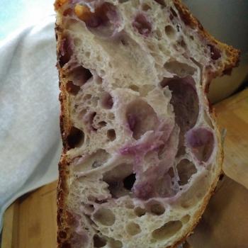 Pluto Sourdough bread with purple sweet potato first slice
