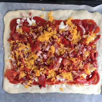 The Hungry Heart pizza second slice